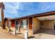 Close-up exterior showcasing a well-maintained front yard with a carport at 3262 E Enid Ave, Mesa, AZ 85204