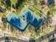 Aerial view of tennis courts nestled within a lush green landscape at 3935 E Rough Rider Rd # 1076, Phoenix, AZ 85050