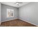 Bedroom with neutral walls, carpet, a window with blinds and an electrical outlet at 3935 E Rough Rider Rd # 1076, Phoenix, AZ 85050