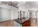 Open-concept living room features a large island with granite countertops and lots of space at 3935 E Rough Rider Rd # 1076, Phoenix, AZ 85050