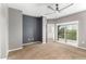 Main bedroom featuring neutral paint, large windows, and a ceiling fan at 3935 E Rough Rider Rd # 1076, Phoenix, AZ 85050