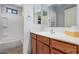 Bright bathroom with sink, vanity, and bathtub at 4116 N 105Th Ln, Phoenix, AZ 85037