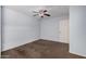 Bedroom with ceiling fan and painted blue at 4116 N 105Th Ln, Phoenix, AZ 85037