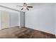 Bedroom with ceiling fan and light blue walls at 4116 N 105Th Ln, Phoenix, AZ 85037