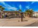 Charming single-story home with covered parking, desert landscaping and mailbox with street number at 4116 N 105Th Ln, Phoenix, AZ 85037