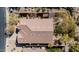 Aerial view of the home's roof and fenced backyard with desert landscaping at 4365 S Columbine Way, Gold Canyon, AZ 85118