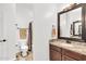 This bathroom has tile floors, granite counters, a shower with curtain, a mirror and toilet at 4365 S Columbine Way, Gold Canyon, AZ 85118
