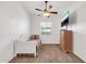 This bedroom features a ceiling fan, a cozy bed, a dresser for storage, and a window for natural light at 4365 S Columbine Way, Gold Canyon, AZ 85118