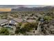 Neighborhood view with desert landscaping, houses, and mountain backdrop at 4365 S Columbine Way, Gold Canyon, AZ 85118