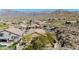 Neighborhood view with desert landscaping and mountains in the background at 4365 S Columbine Way, Gold Canyon, AZ 85118