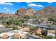 Scenic aerial view of the neighborhood, showcasing the property's proximity to the majestic mountain landscape at 4448 E Camelback Rd # 16, Phoenix, AZ 85018