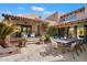 Picturesque backyard featuring a patio, dining area, and lush greenery, ideal for outdoor gatherings and enjoying the serene ambiance at 4448 E Camelback Rd # 16, Phoenix, AZ 85018