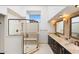 Elegant bathroom featuring a large glass shower, dual sinks, and luxury finishes at 4448 E Camelback Rd # 16, Phoenix, AZ 85018