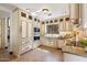 Well-appointed kitchen with custom cabinets, granite counters, and modern appliances creating a chef's delight at 4448 E Camelback Rd # 16, Phoenix, AZ 85018