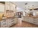 Spacious kitchen featuring custom cabinetry, granite countertops, and modern appliances for culinary enthusiasts at 4448 E Camelback Rd # 16, Phoenix, AZ 85018