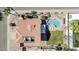 This aerial view highlights a backyard with a pool, and a red tile roof on a sunny day at 4530 E Vista Dr, Phoenix, AZ 85032