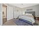 Tastefully furnished bedroom showcases stylish décor, rug, and closet at 4530 E Vista Dr, Phoenix, AZ 85032