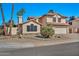 Charming two-story home featuring a well-maintained yard and a classic tile roof at 4530 E Vista Dr, Phoenix, AZ 85032
