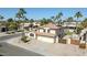 Lovely two-story home with a tile roof, well-maintained landscaping, and a spacious driveway at 4530 E Vista Dr, Phoenix, AZ 85032