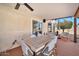 Covered patio with dining table and chairs, ideal for outdoor dining and relaxation at 4530 E Vista Dr, Phoenix, AZ 85032