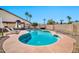 Inviting backyard pool with lounge chairs, palm trees, and ample space for outdoor enjoyment at 4530 E Vista Dr, Phoenix, AZ 85032
