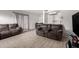 Spacious living room with tile floors and view of dining area at 4615 E Southgate Ave, Phoenix, AZ 85040