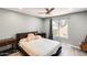 Bright bedroom featuring natural light, a ceiling fan, and neutral paint for a serene and inviting atmosphere at 4730 W Northern Ave # 1102, Glendale, AZ 85301