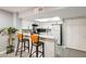 Kitchen with breakfast bar, white cabinets, and stainless steel appliances at 4730 W Northern Ave # 1102, Glendale, AZ 85301