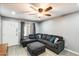Comfortable living room with a large sectional sofa, modern TV and light, gray walls at 4730 W Northern Ave # 1102, Glendale, AZ 85301