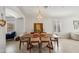 Well-lit dining room with modern decor, stylish furniture, and an open layout at 5102 E Libby St, Scottsdale, AZ 85254