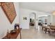 Open dining area with views of the living spaces, featuring modern furniture and neutral decor at 5102 E Libby St, Scottsdale, AZ 85254