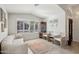 Elegant entryway featuring tile floors, high ceilings, and a decorative chandelier at 5102 E Libby St, Scottsdale, AZ 85254