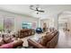 Spacious living room with comfortable seating, bright natural light, and an open layout at 5102 E Libby St, Scottsdale, AZ 85254