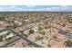 Overhead view of a residential area, highlighting mature trees, pools, and well-maintained properties at 5704 E Estrid Ave, Scottsdale, AZ 85254