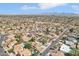Expansive aerial view of the neighborhood showcasing lush landscaping, single-story homes and scenic mountain views at 5704 E Estrid Ave, Scottsdale, AZ 85254