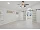 Bright main bedroom with barn doors leading into ensuite bathroom at 5704 E Estrid Ave, Scottsdale, AZ 85254