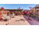 Private backyard with brick patio and flowering bushes at 5905 N 83Rd St, Scottsdale, AZ 85250