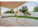 Expansive backyard with grass lawn, patio, and privacy fence at 62 N Amber Ct, Chandler, AZ 85225