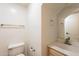Bathroom with neutral colors, modern sink and faucet, vanity cabinet and chrome hardware at 62 N Amber Ct, Chandler, AZ 85225