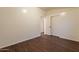 Bedroom featuring hardwood floors and a double-door closet at 62 N Amber Ct, Chandler, AZ 85225