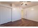 Bedroom featuring hardwood floors and a double door closet at 62 N Amber Ct, Chandler, AZ 85225
