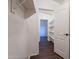 Walk-in closet with built-in shelving and hardwood floors at 62 N Amber Ct, Chandler, AZ 85225