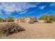 Charming single-story home with a three-car garage, desert landscaping, and desert surroundings at 730 E Tanya Trl, Phoenix, AZ 85086