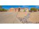 Charming single-story home with a three-car garage and desert landscaping at 730 E Tanya Trl, Phoenix, AZ 85086