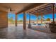 Elegant outdoor patio area with a pergola, seating, and a view of the pool at 730 E Tanya Trl, Phoenix, AZ 85086