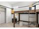 Modern bedroom featuring a loft bed, playful accents, and neutral decor at 7441 W Buckhorn Trl, Peoria, AZ 85383