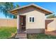 Open shed with a door and a window and interior at 8812 W Hess St, Tolleson, AZ 85353