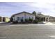 Inviting single-story home featuring desert landscaping and a covered carport at 891 W Moon Shadow Dr, Casa Grande, AZ 85122