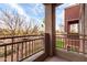 Balcony view with wrought iron railing, offering views of neighborhood and blue skies at 900 S 94Th St # 1203, Chandler, AZ 85224