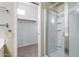 A well-lit bathroom with a glass door shower and easy access to the walk-in closet at 900 S 94Th St # 1203, Chandler, AZ 85224